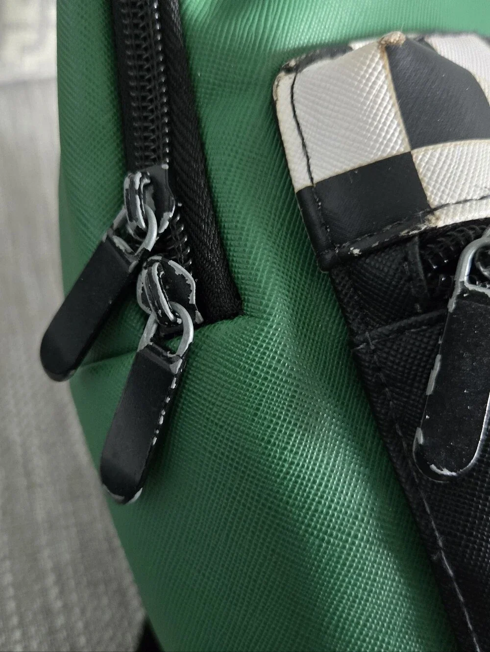 This green and black Friends Central Perk faux leather mini backpack